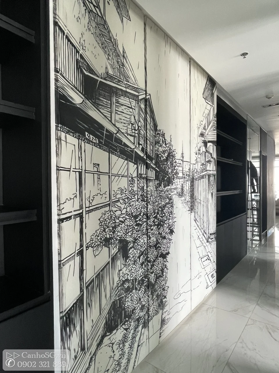 Vách trang trí nghệ thuật màu đen trắng dọc hành lang căn hộ cao cấp, kết hợp hệ tủ và kệ âm tường
