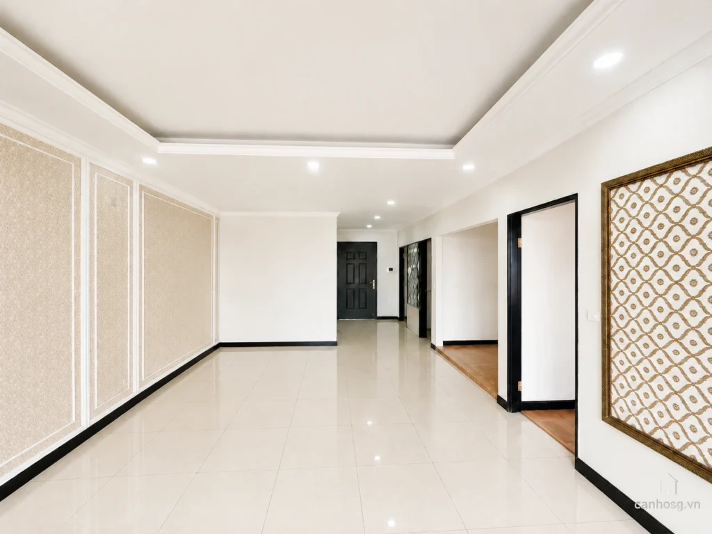 Phòng khách căn hộ The Flemington 96m² nhìn về khu vực cửa vào, tường trang trí đẹp và sàn gạch bóng.